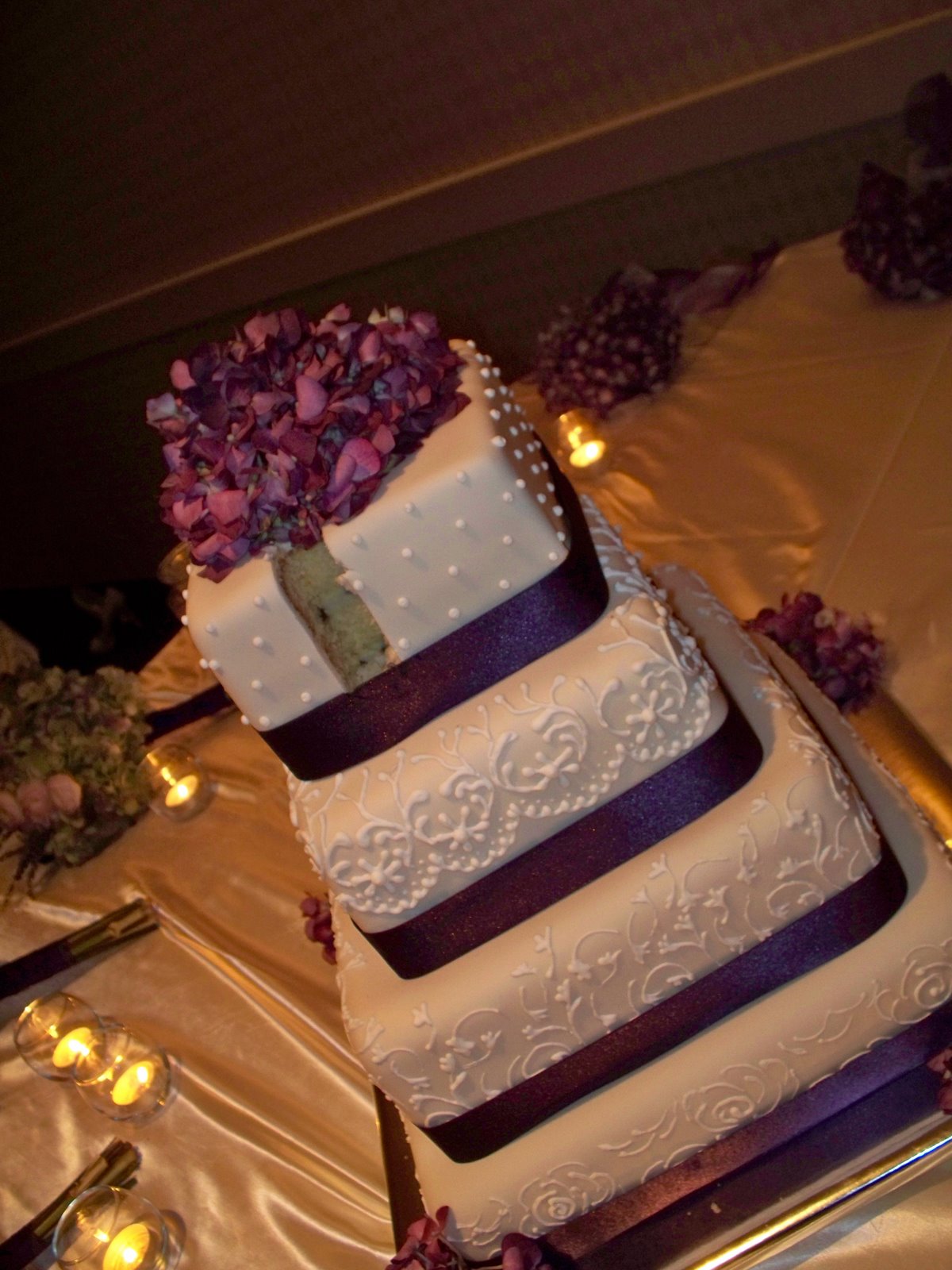 gold and purple wedding cake