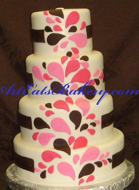 Modern four tier custom pink and brown fondant splash design wedding cake 