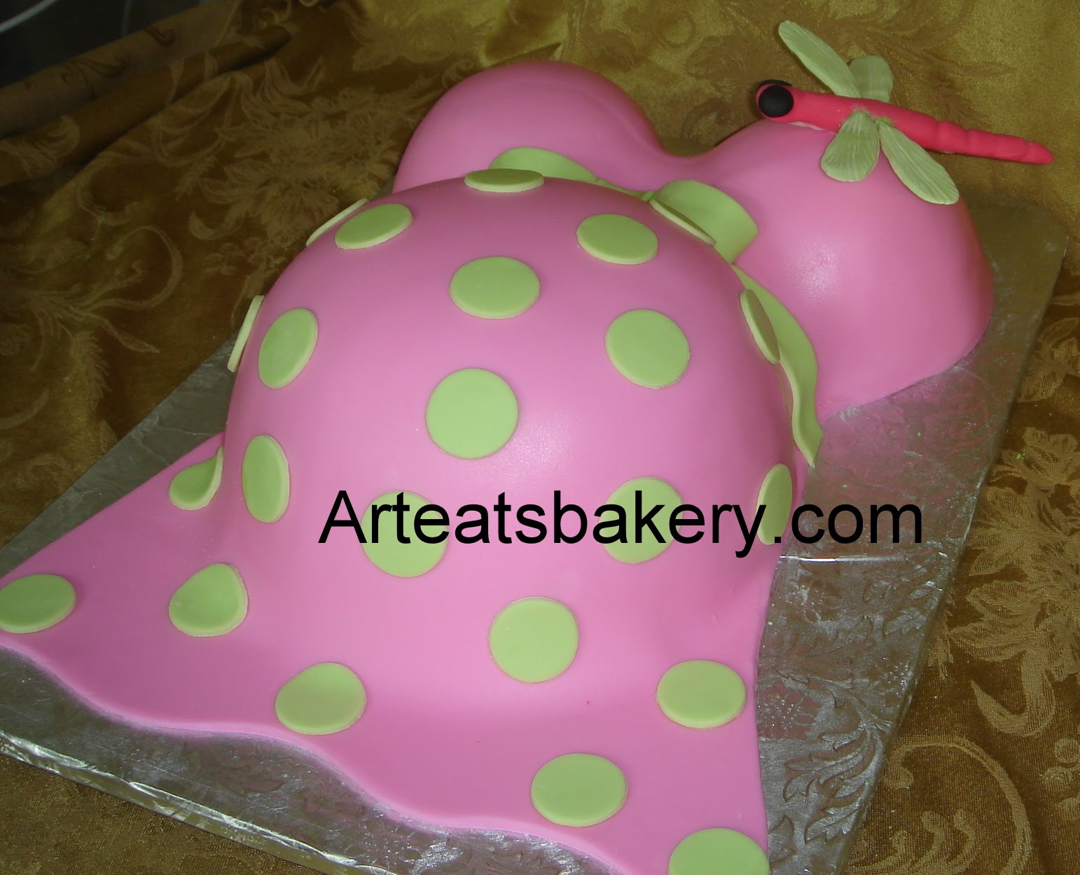 Maternity top in pink fondant with green polka dots and ribbon tied in ...